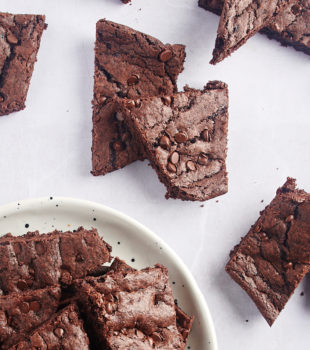 Overhead view of brownie brittle on countertop and plate