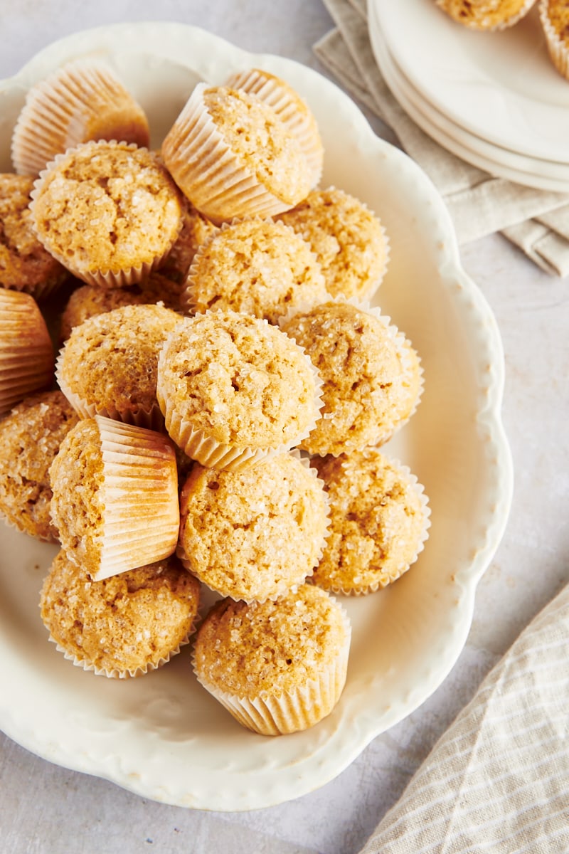 Overhead view of cinnamon mini muffins stacked on platter