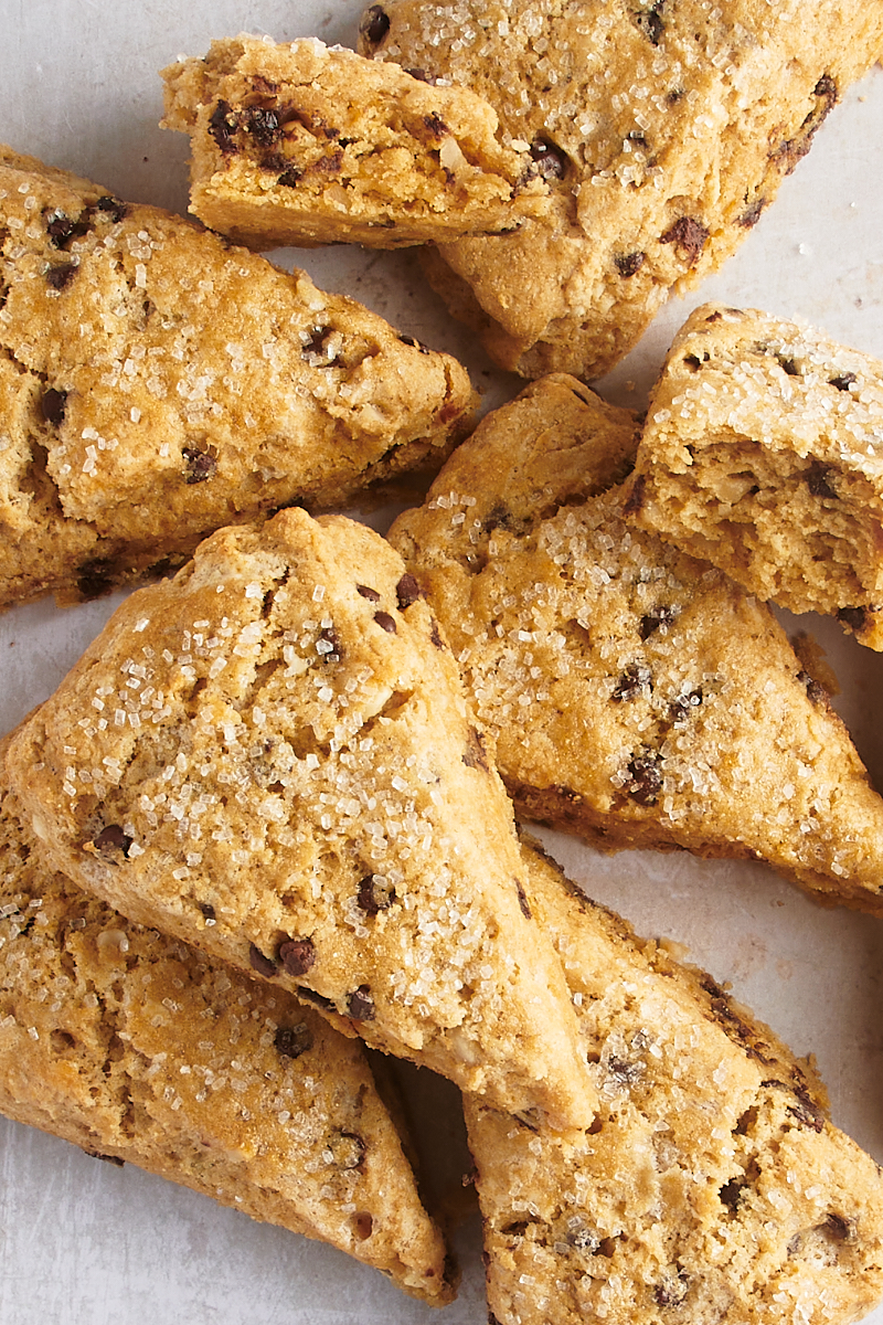 Chocolate chip-hazelnut scones piled on parchment paper