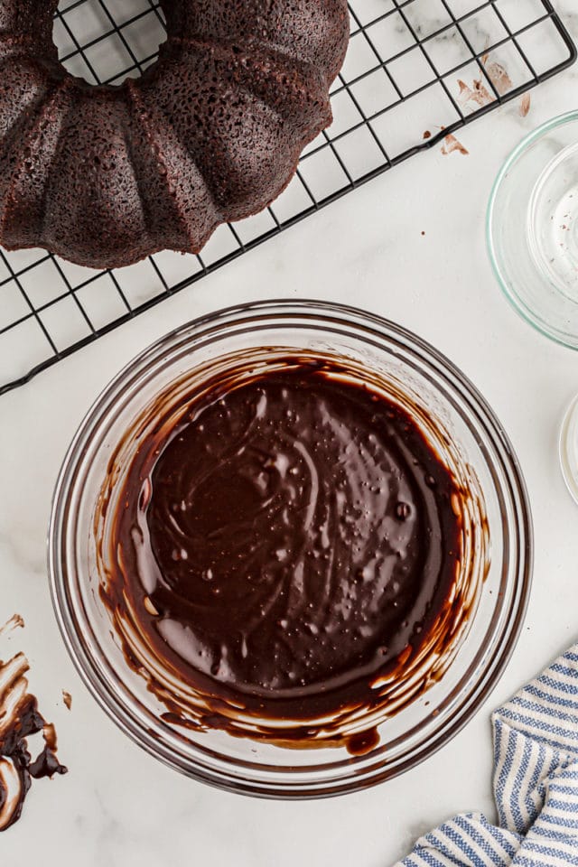 Overhead view of chocolate glaze in glass bowl