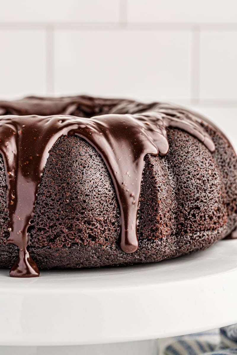 Whole chocolate sour cream Bundt cake with dripping glaze