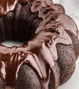 Whole chocolate sour cream Bundt cake on cake stand