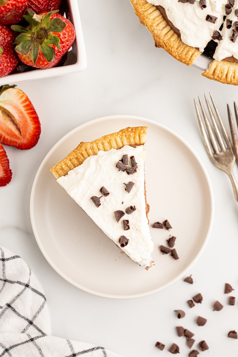 Overhead view of French silk pie slice on white plate