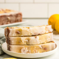 3 slices of lemon bread stacked on plate