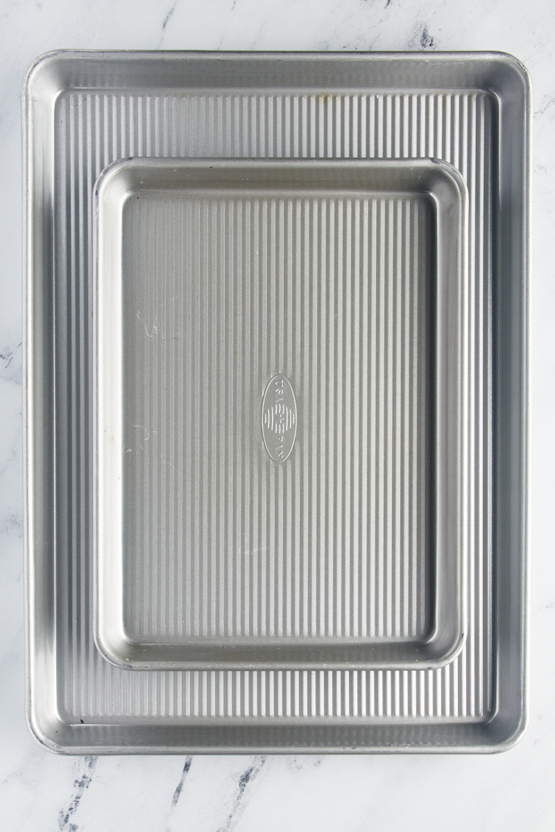 overhead view of a quarter sheet pan on top of a half sheet pan