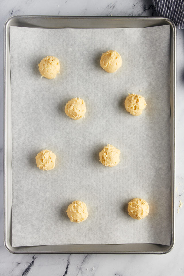 Overhead view of tea cake dough on a baking sheet ready to go into the oven.