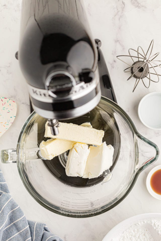 overhead view of butter and shortening in the bowl of a stand mixer