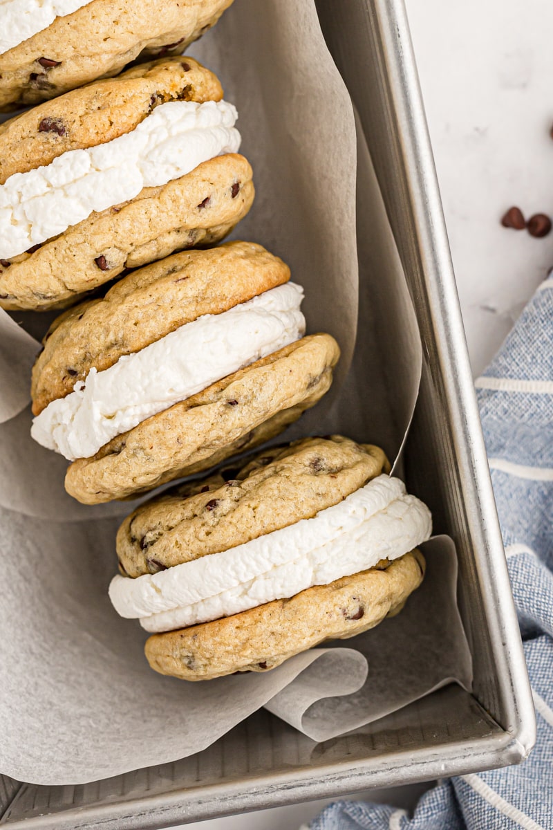 overhead view of three Chocolate Chip Cookie Sandwiches in a parchment-lined loaf pan