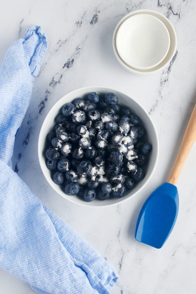 Overhead view of ingredients for blueberry filling in bowl