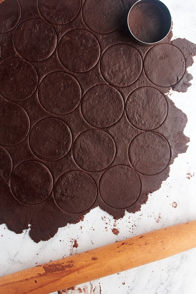 overhead view of rolled and cut chocolate cookie dough