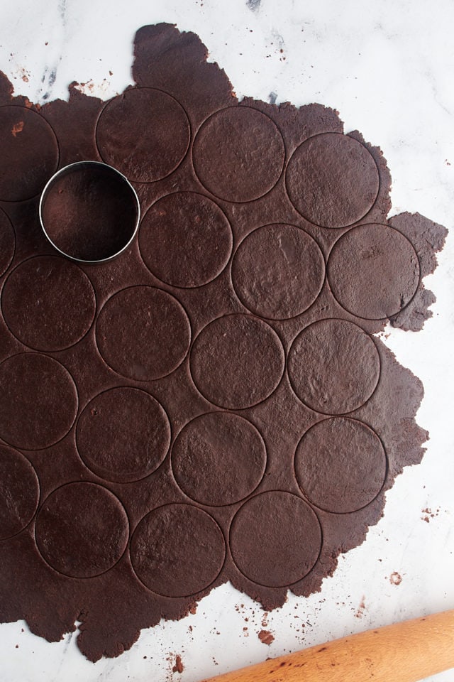 overhead view of cut chocolate wafer cookie dough on a marble surface