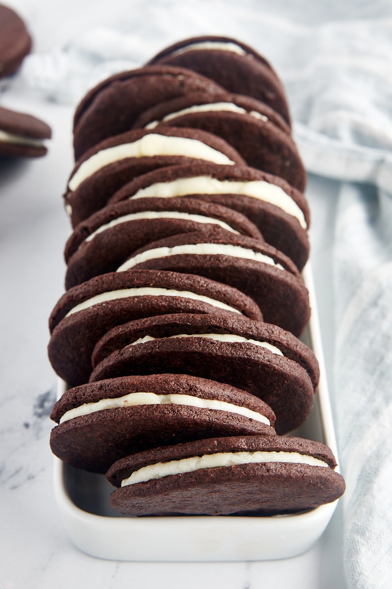 Homemade Oreo cookies in a narrow white tray