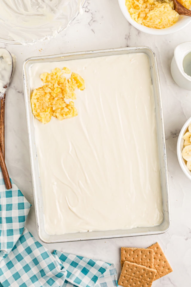 Adding pineapple to banana split cake