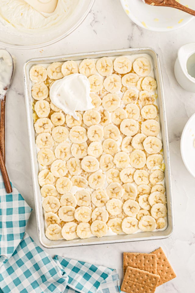 Overhead view of banana layer of banana split cake