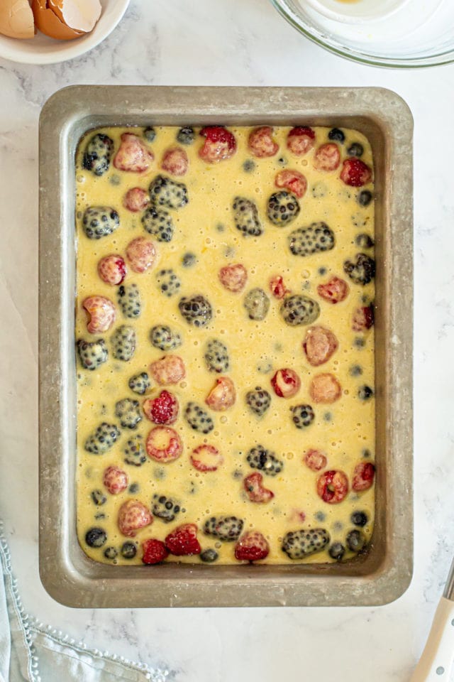 overhead view of berry pudding cake ready to go into the oven
