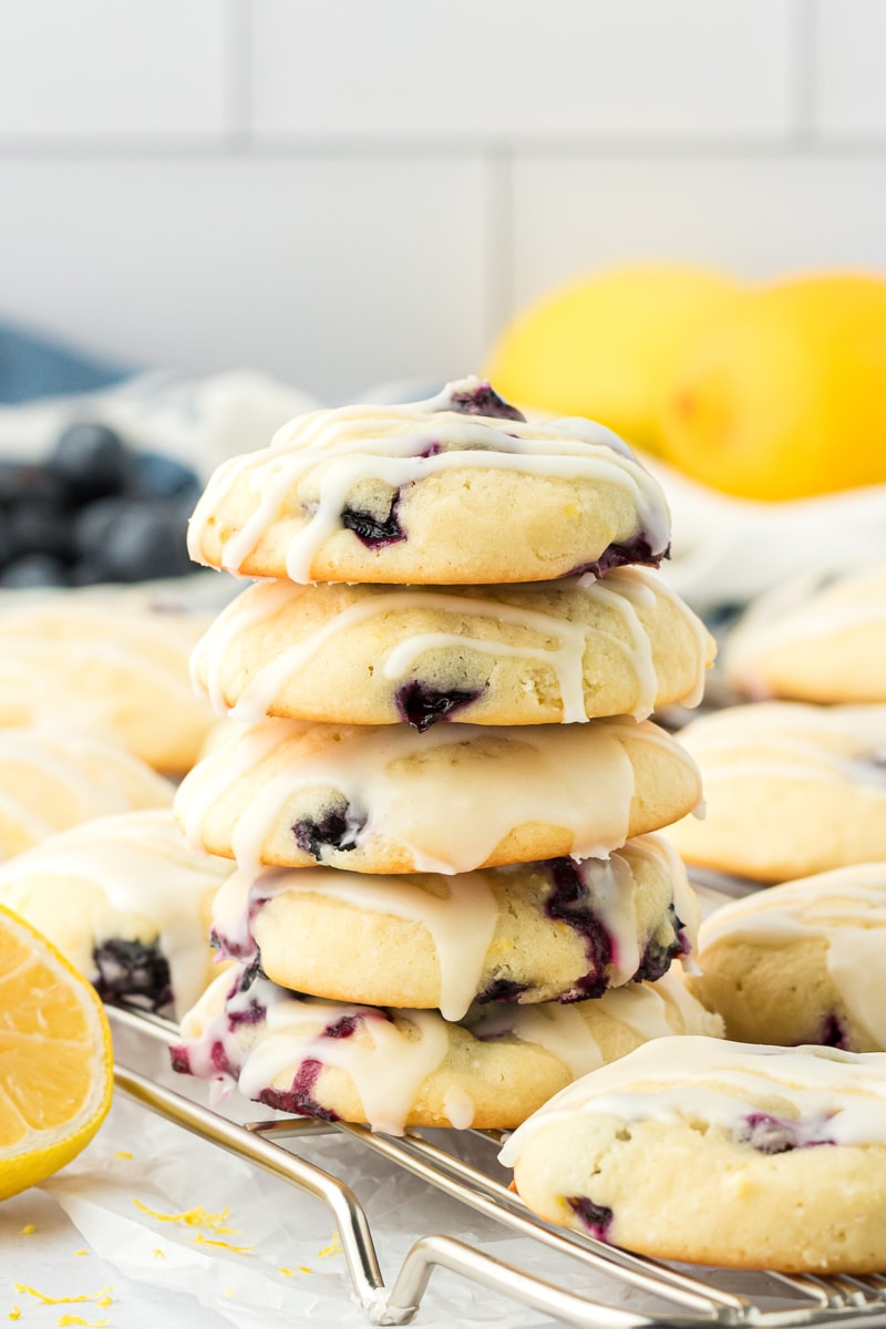 a stack of five lemon blueberry cookies on a wire rack