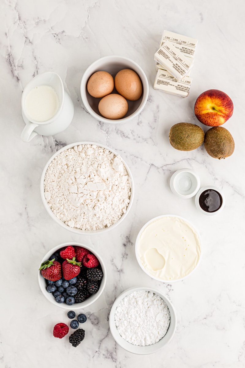 overhead view of ingredients for mini fruit tarts