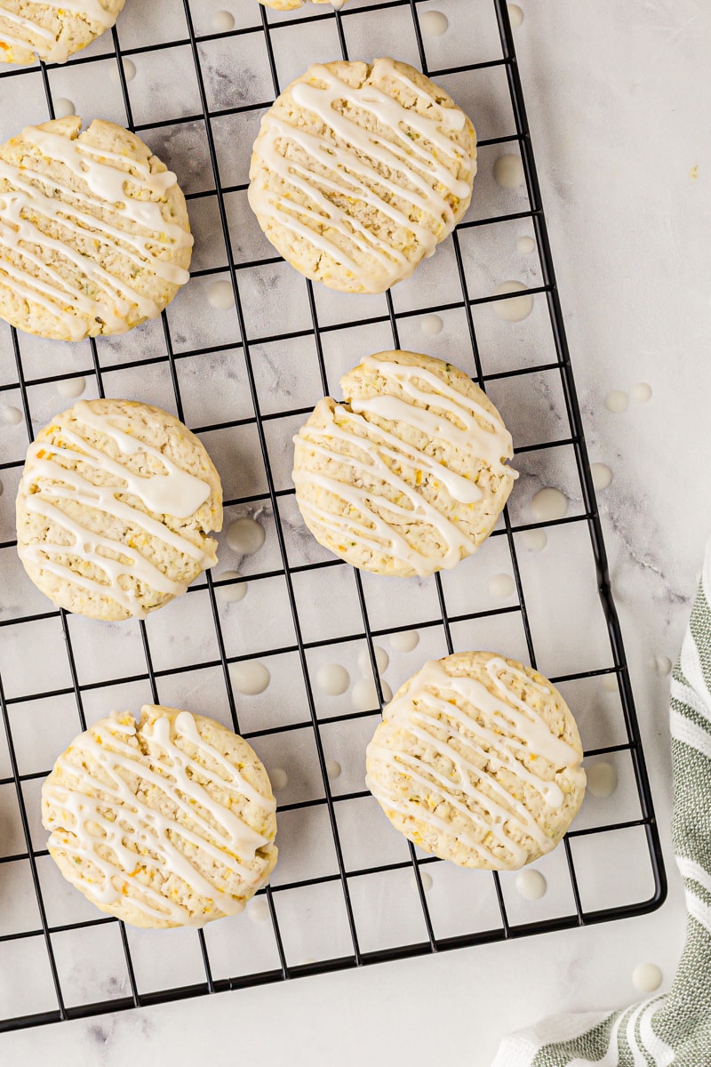 overhead view of glazed citrus sugar cookies on a wire rack