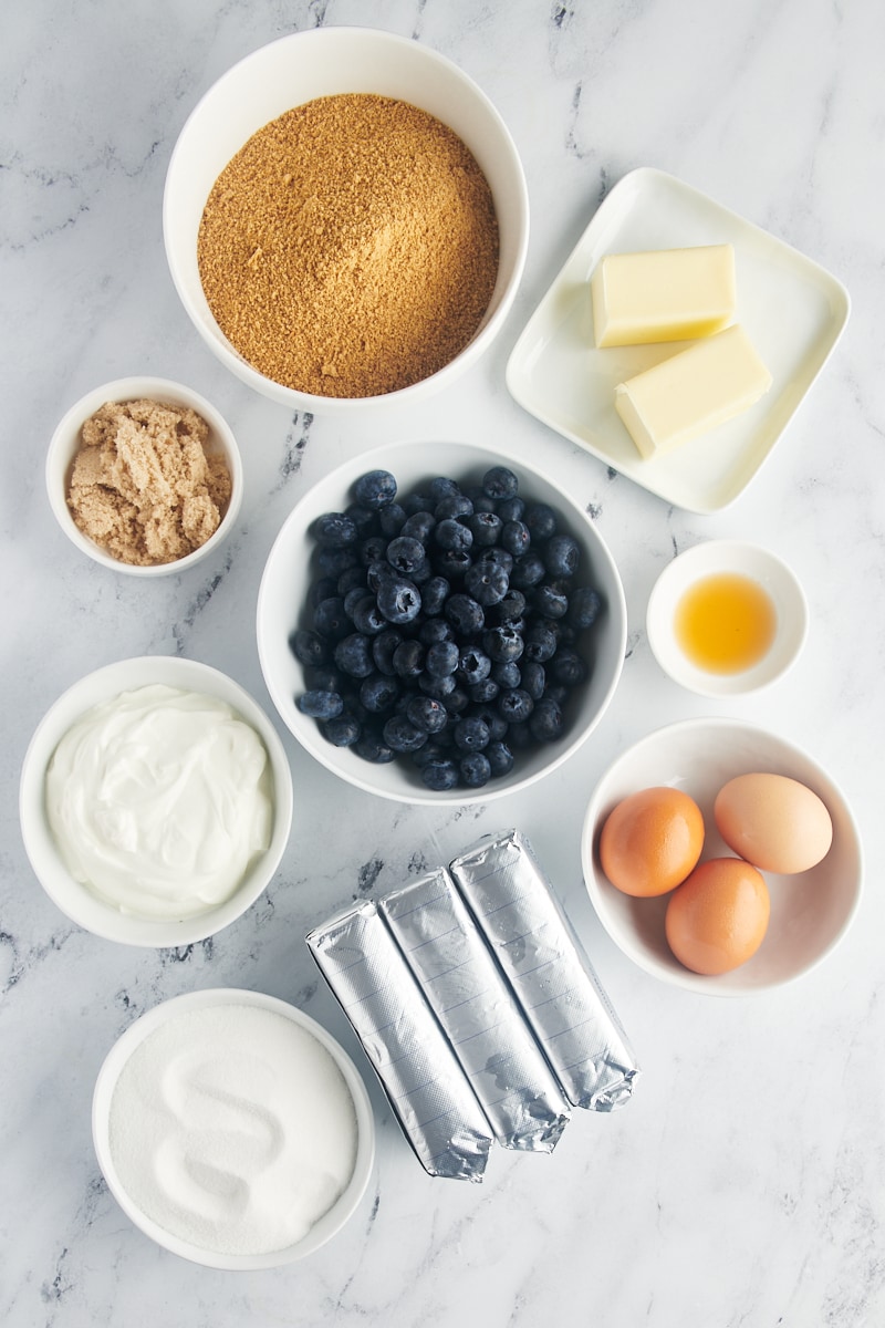overhead view of ingredients for blueberry cheesecake