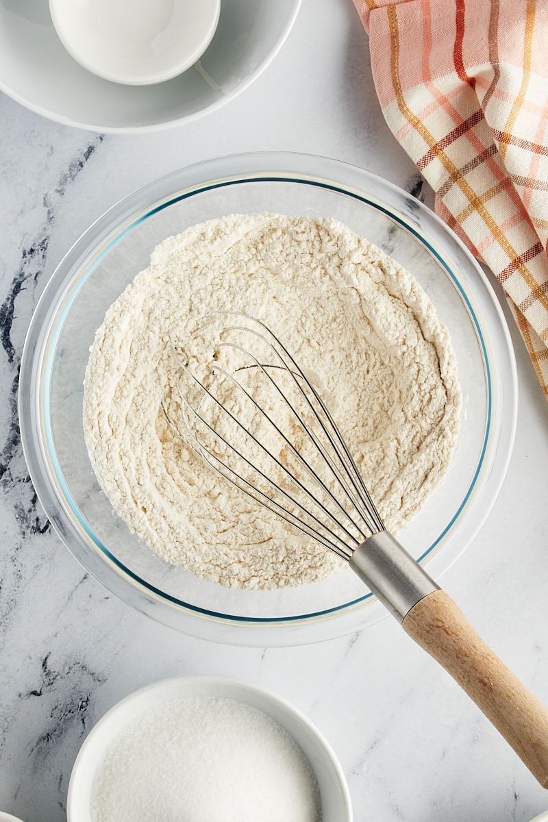 Mixed dry ingredients for the raspberry coffee cake, showing a uniform blend of flour, leavening agents, and salt.