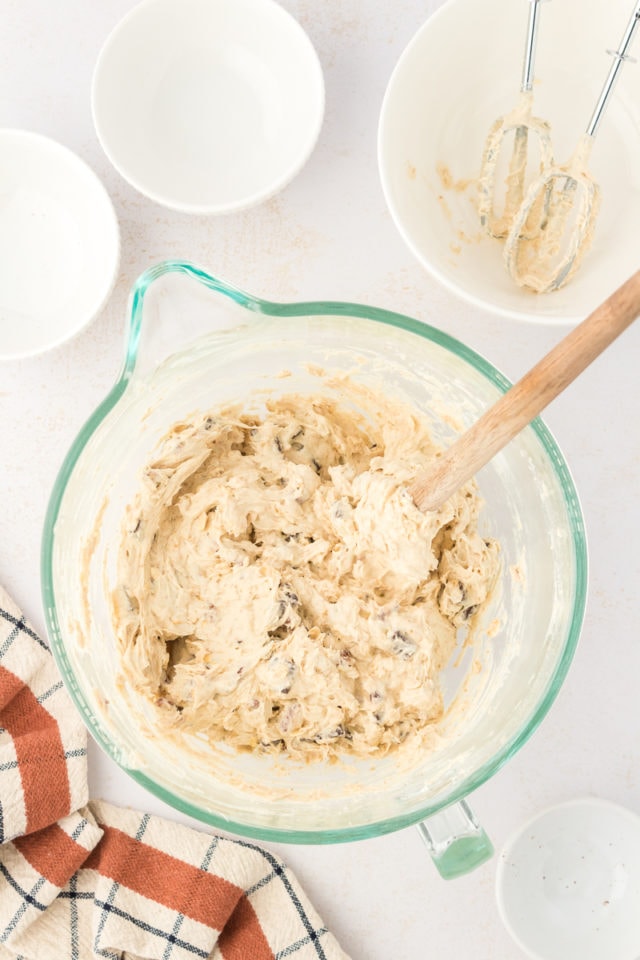 Overhead view of banana cookie dough in mixing bowl