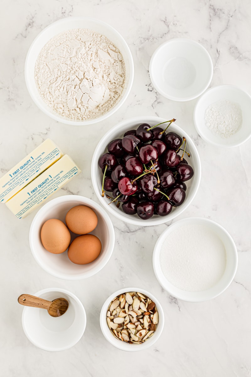 Overhead view of ingredients for cherry almond sheet cake