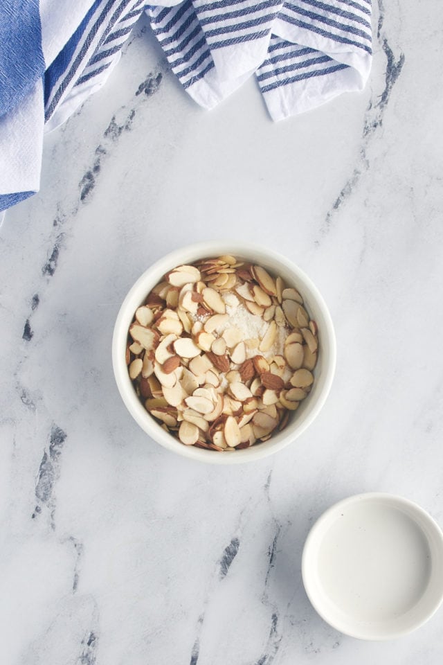 Overhead view of almonds added to crumb mixture