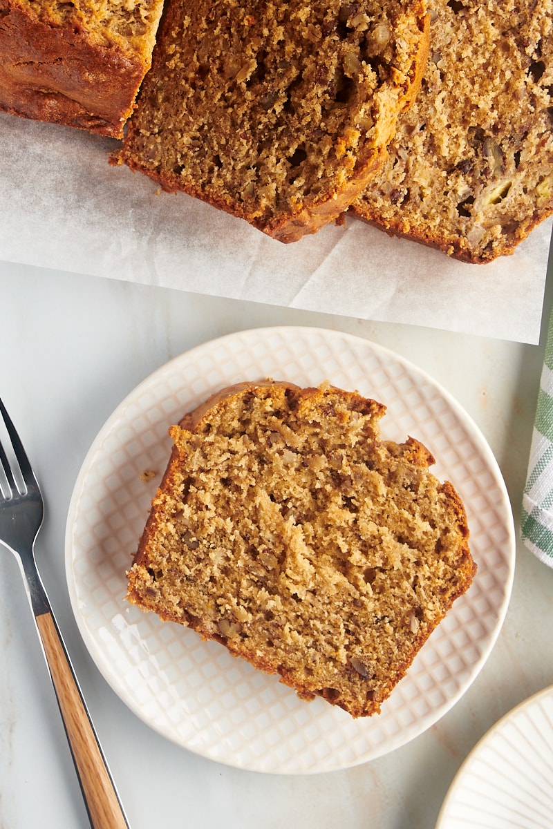 Slice of peanut butter banana bread on white plate