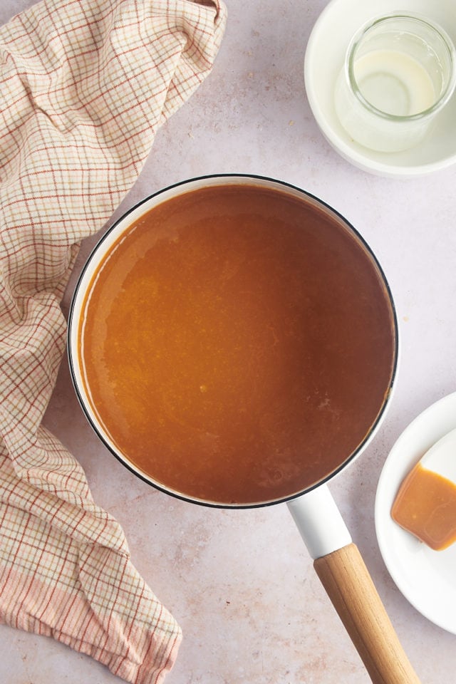 Overhead view of melted caramel in saucepan