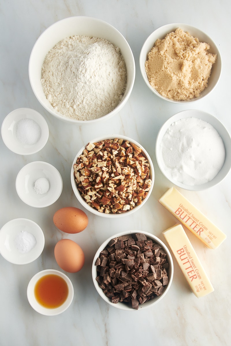 Overhead view of ingredients for chocolate chunk pecan cookies