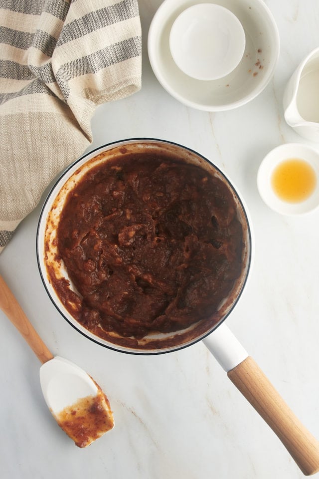 Overhead view of date filling in saucepan