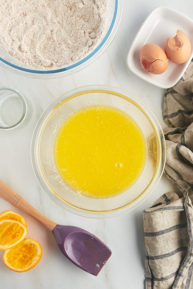 overhead view of mixed wet ingredients for date nut muffins