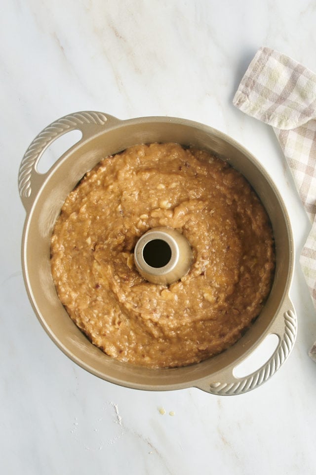 Overhead view of pear bread batter in pan