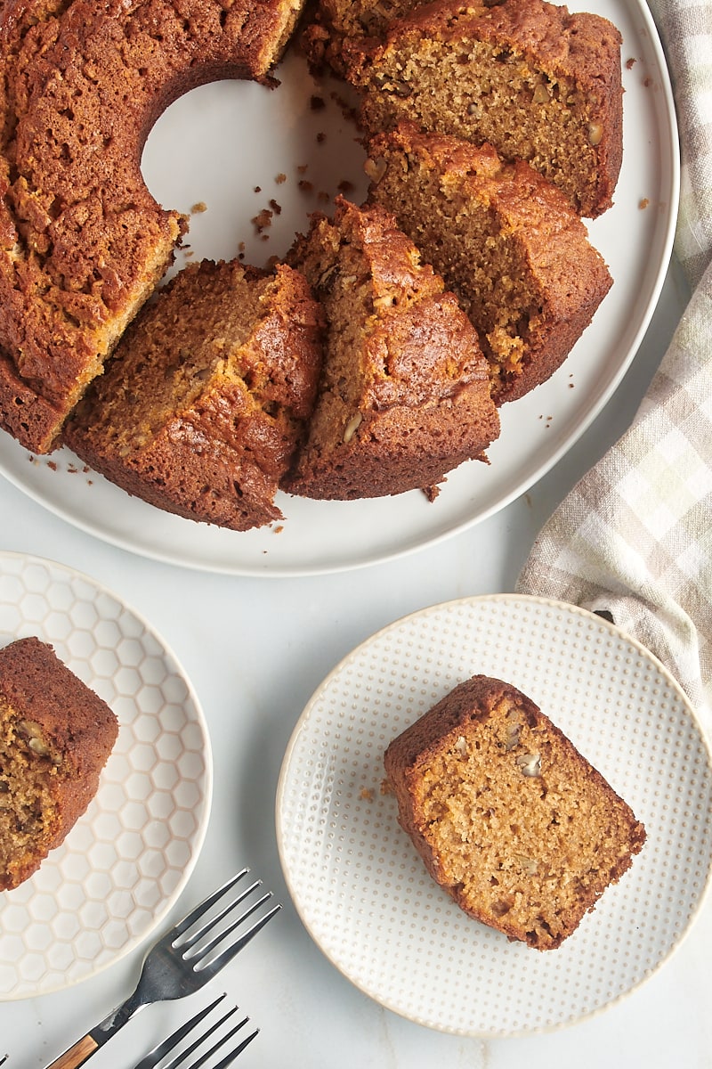 Overhead view of pear bread on plates and round serving tray