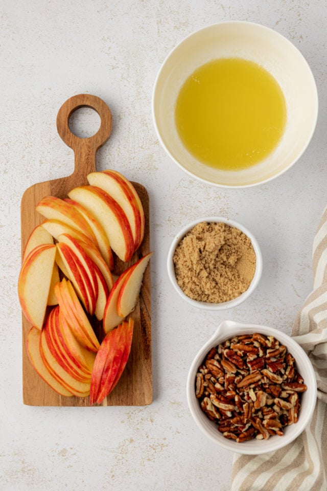 Overhead view of toppings for apple cinnamon baked French toast