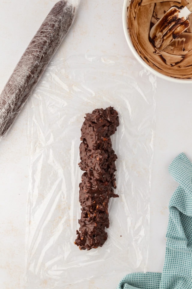 Overhead view of cookie dough added to plastic wrap