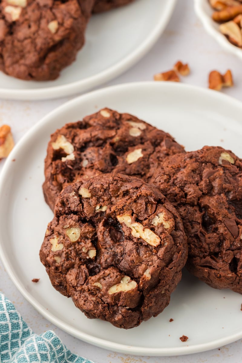 3 double chocolate cookies on white plate