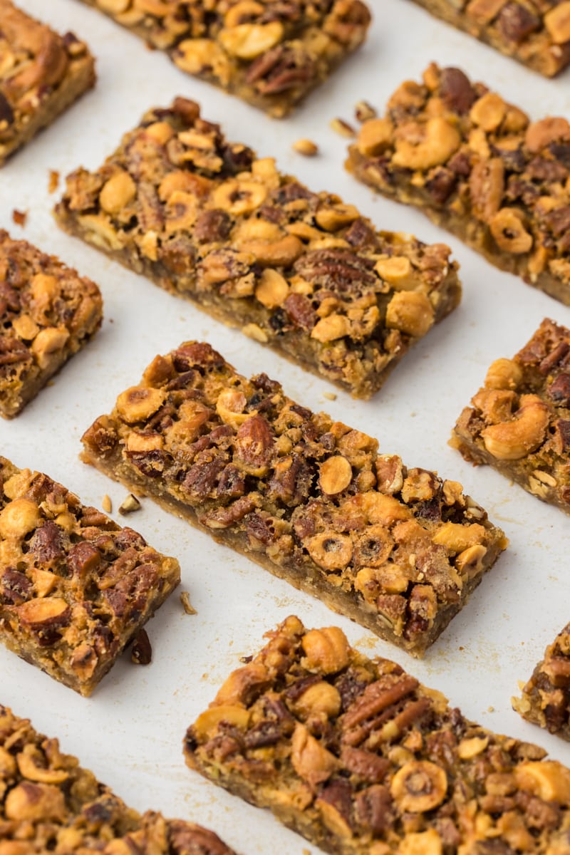 Maple nut bars lined up on countertop