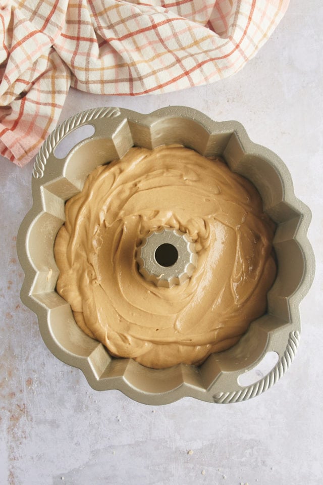 overhead view of Cookie Butter Bundt Cake batter in a Bundt pan