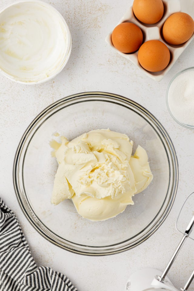 Overhead view of mascarpone in glass mixing bowl