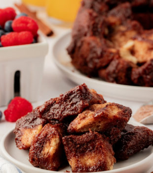Plate of chocolate monkey bread with remaining bread in background