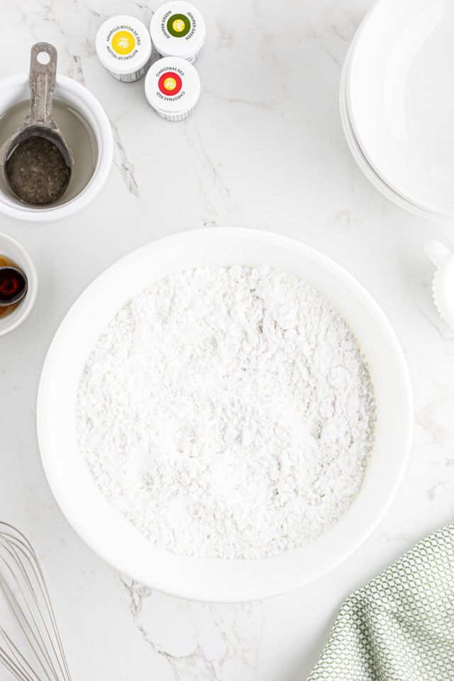 overhead view of confectioners' sugar in a white bowl
