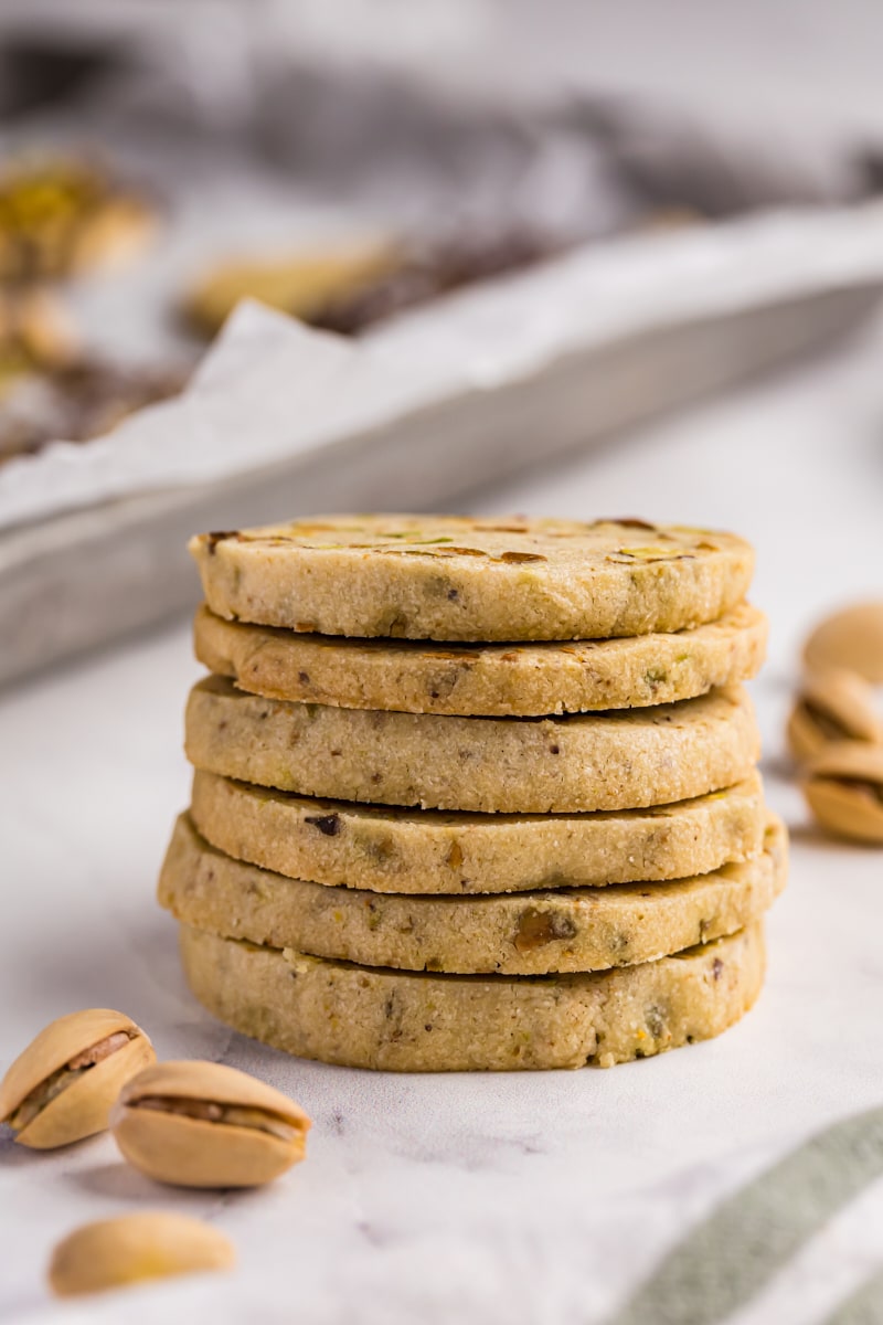 a stack of six pistachio cookies