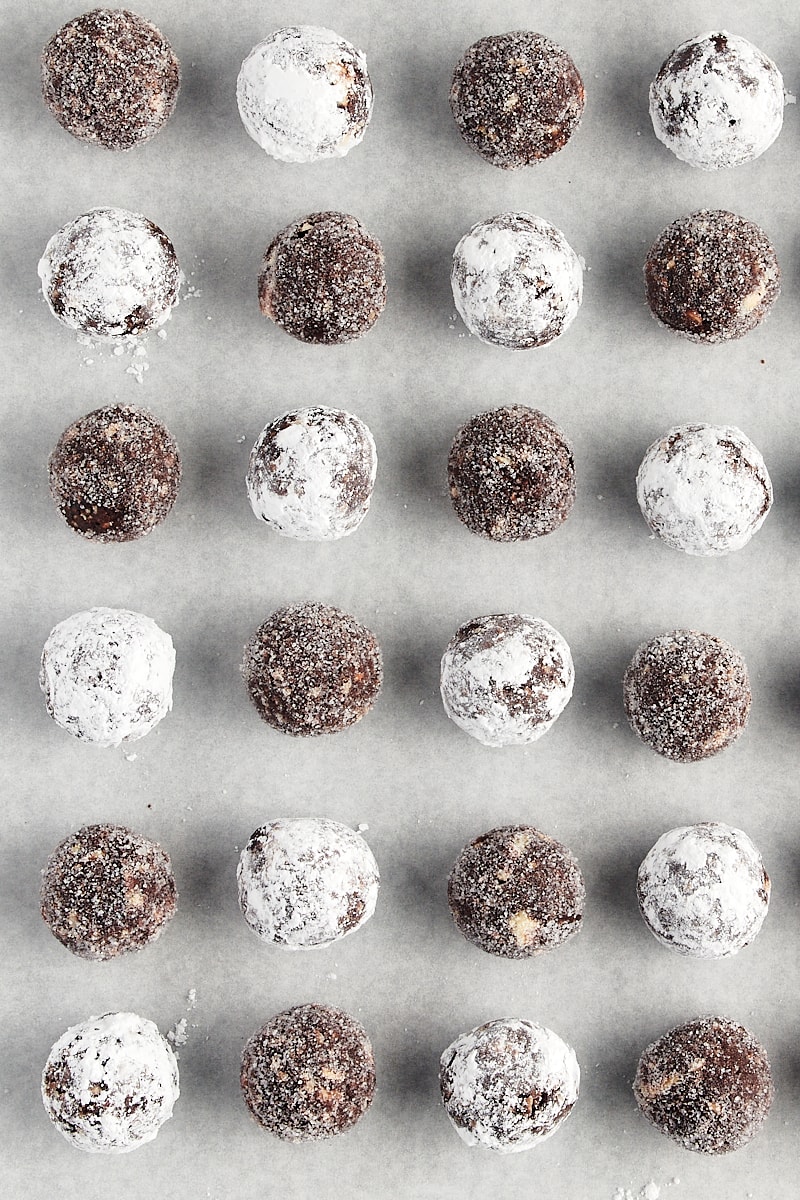 overhead view of bourbon balls on white parchment paper