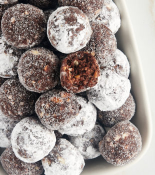 overhead view of bourbon balls piled on a white tray