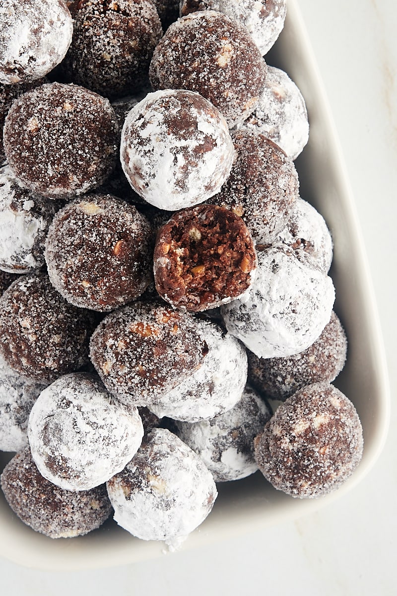 overhead view of bourbon balls piled on a white tray