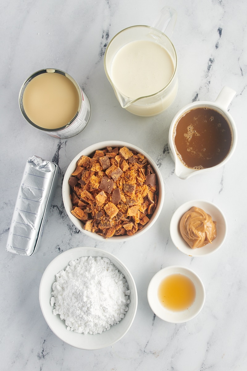 Overhead view of ingredients for Butterfinger cake topping and frosting