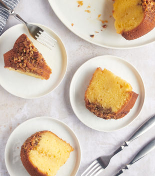 Overhead view of rum cake slices on 3 plates
