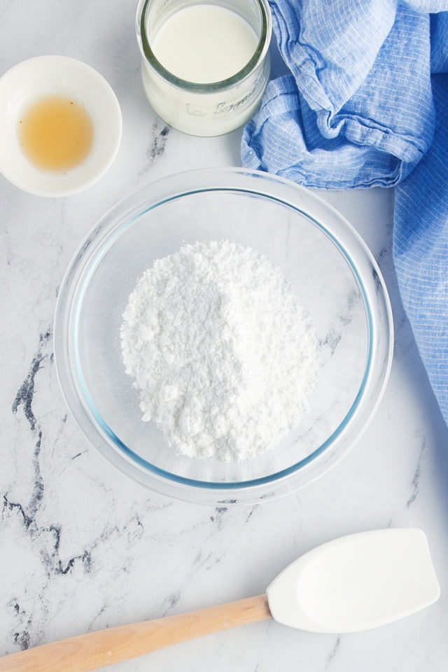 Overhead view of powdered sugar in bowl