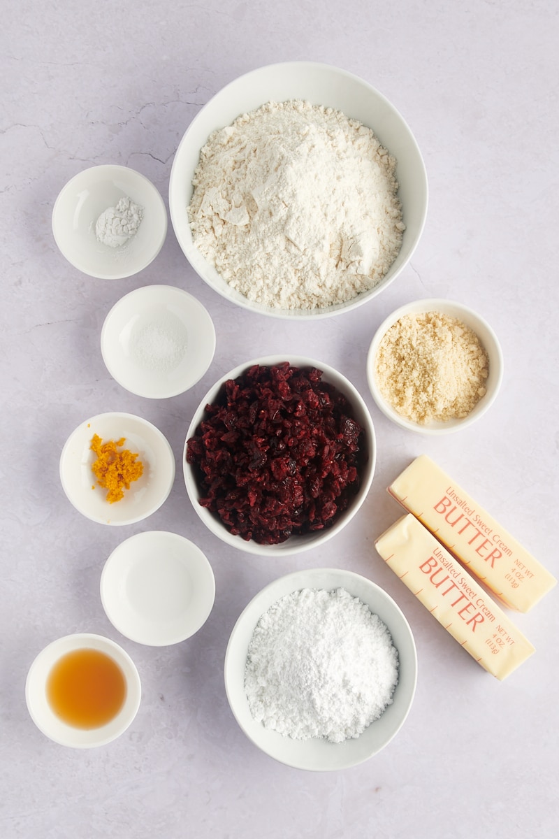 Overhead view of ingredients for cranberry orange shortbread cookies